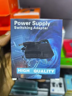 Photo - Tp-Link Wifi Router Adapter (9v-1a Power Adapter)