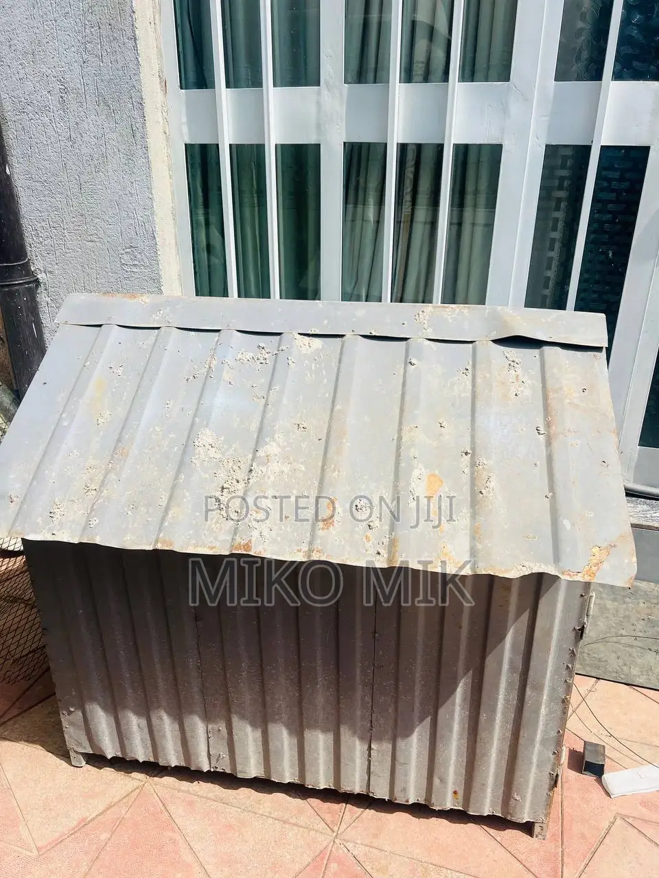 A Metal and Wood Dog House