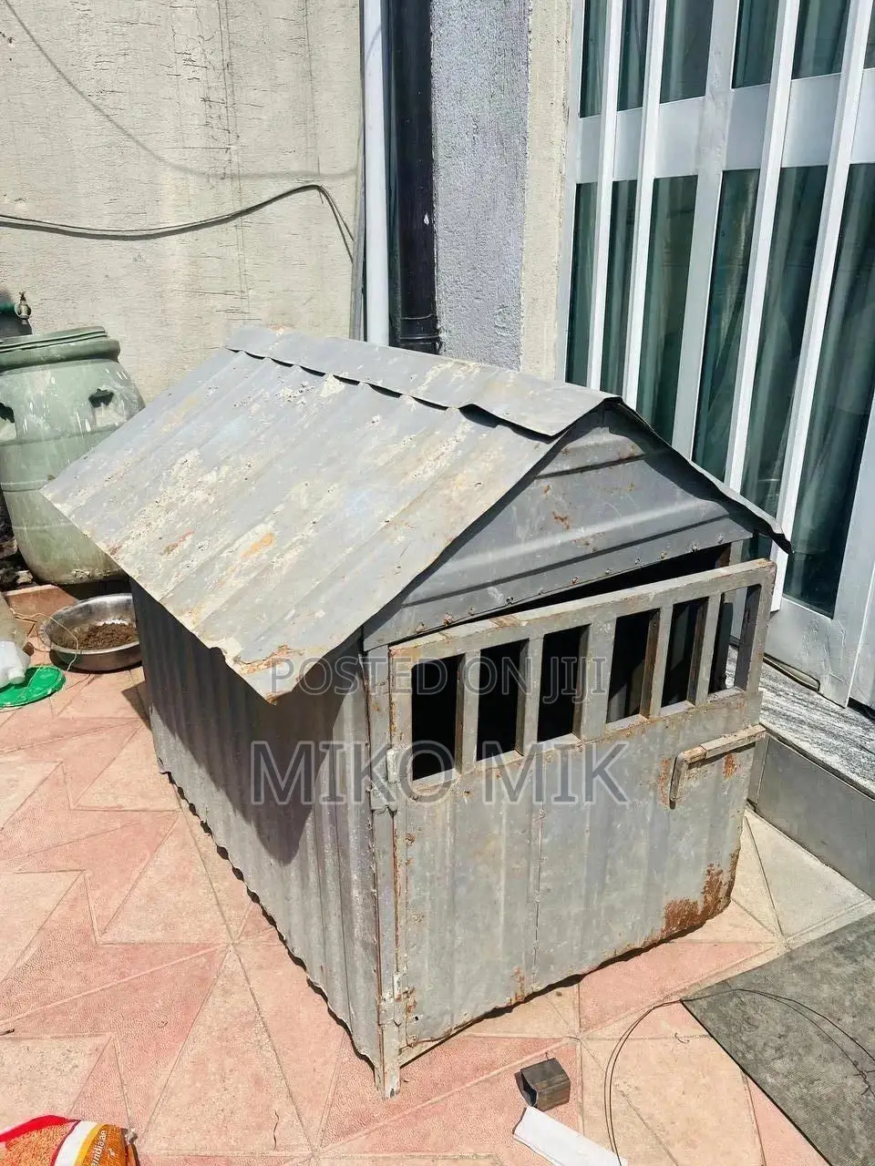 A Metal and Wood Dog House