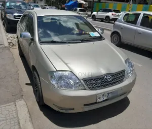 Photo - Toyota Corolla 2003 Gold