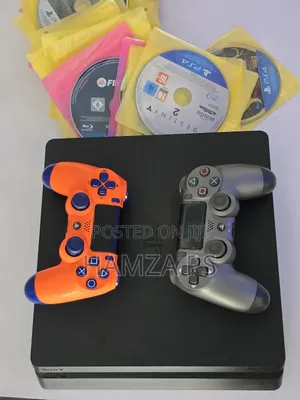 Photo - Ps4 Slim Jailbreak 500gb and 2 Gamepad