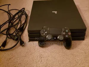 Photo - Playstation 4 Pro Jealbreak ከ15 በላይ Game አለው