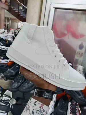 Photo - This Is Apair of White, Brown Multicolor Timberland Boots Snickers