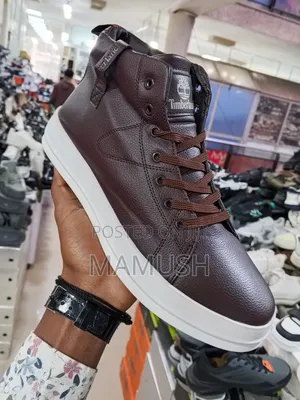 This Is Apair of White, Brown Multicolor Timberland Boots Snickers