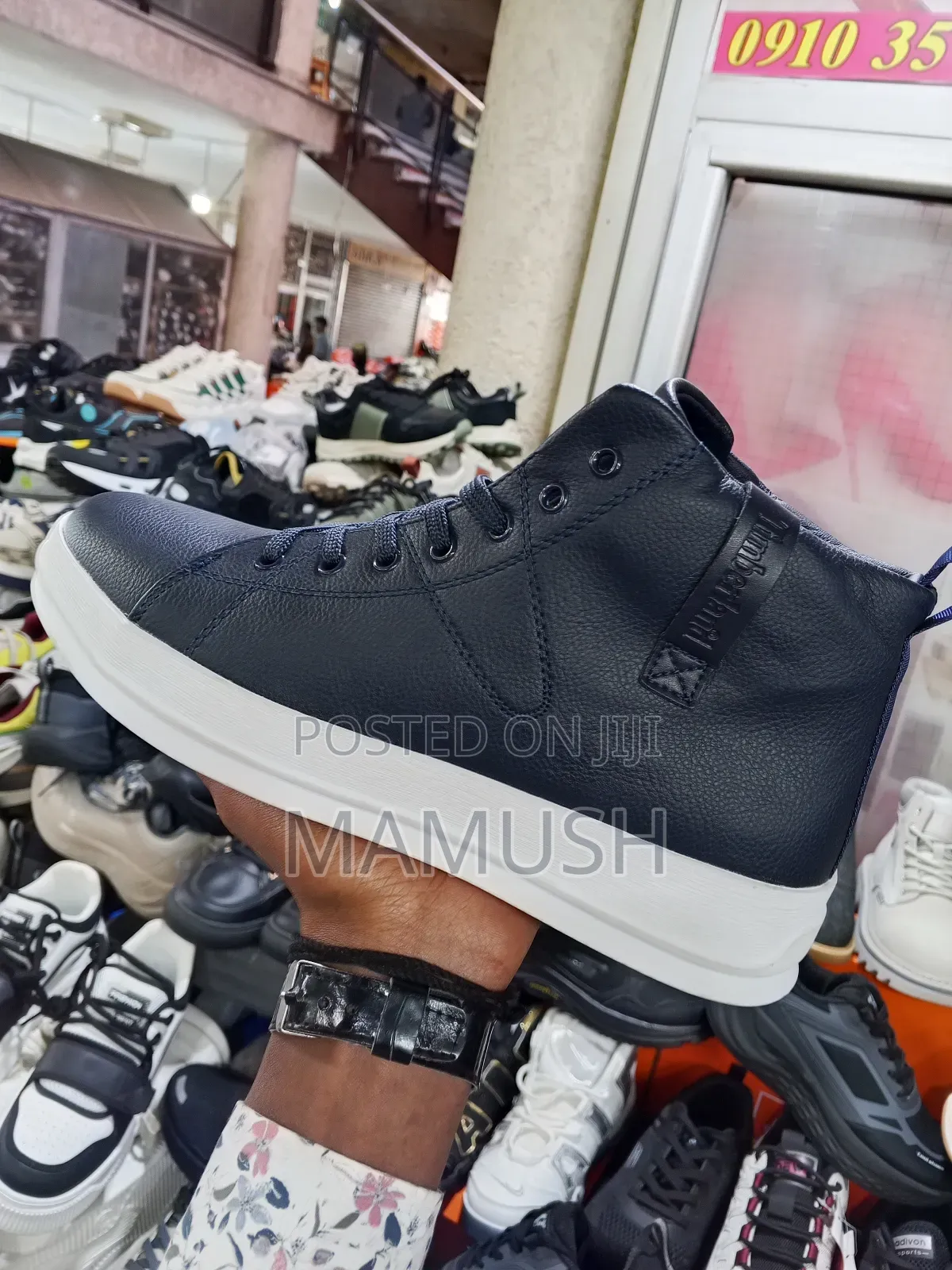 This Is Apair of White, Brown Multicolor Timberland Boots Snickers