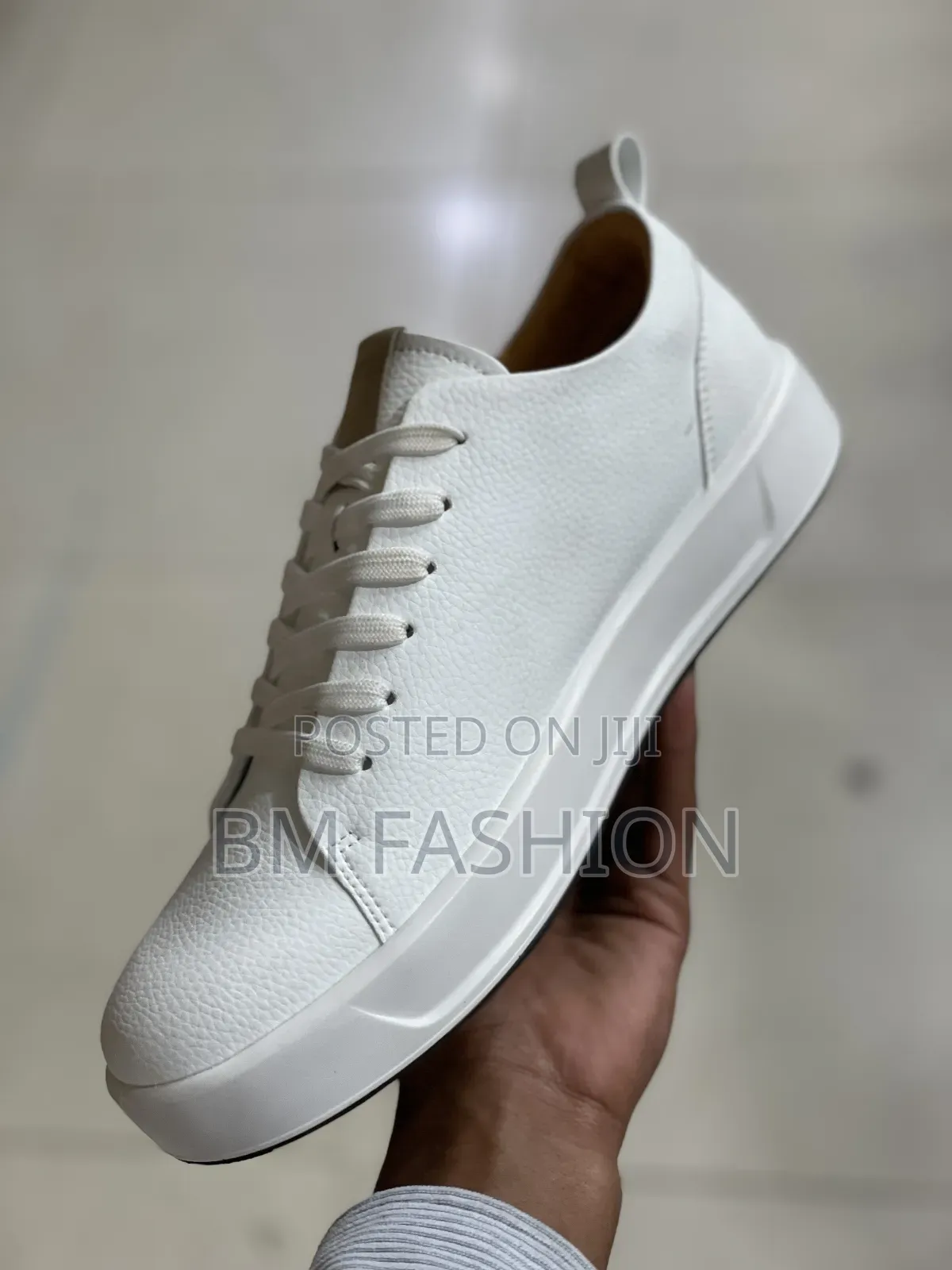 White Ecco Leather Sneakers.