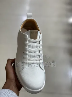 White Ecco Leather Sneakers.
