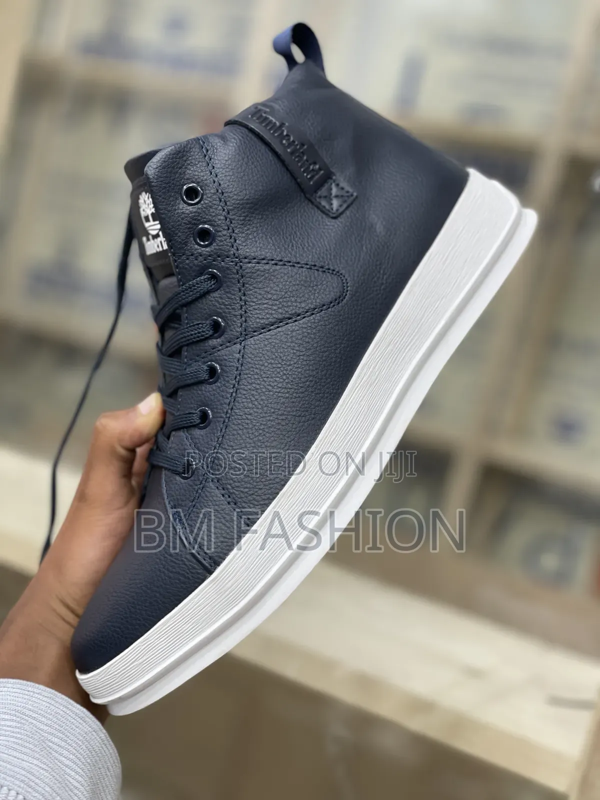 Timberland High-Top Sneakers With a Navy Blue Upper and a White Sole