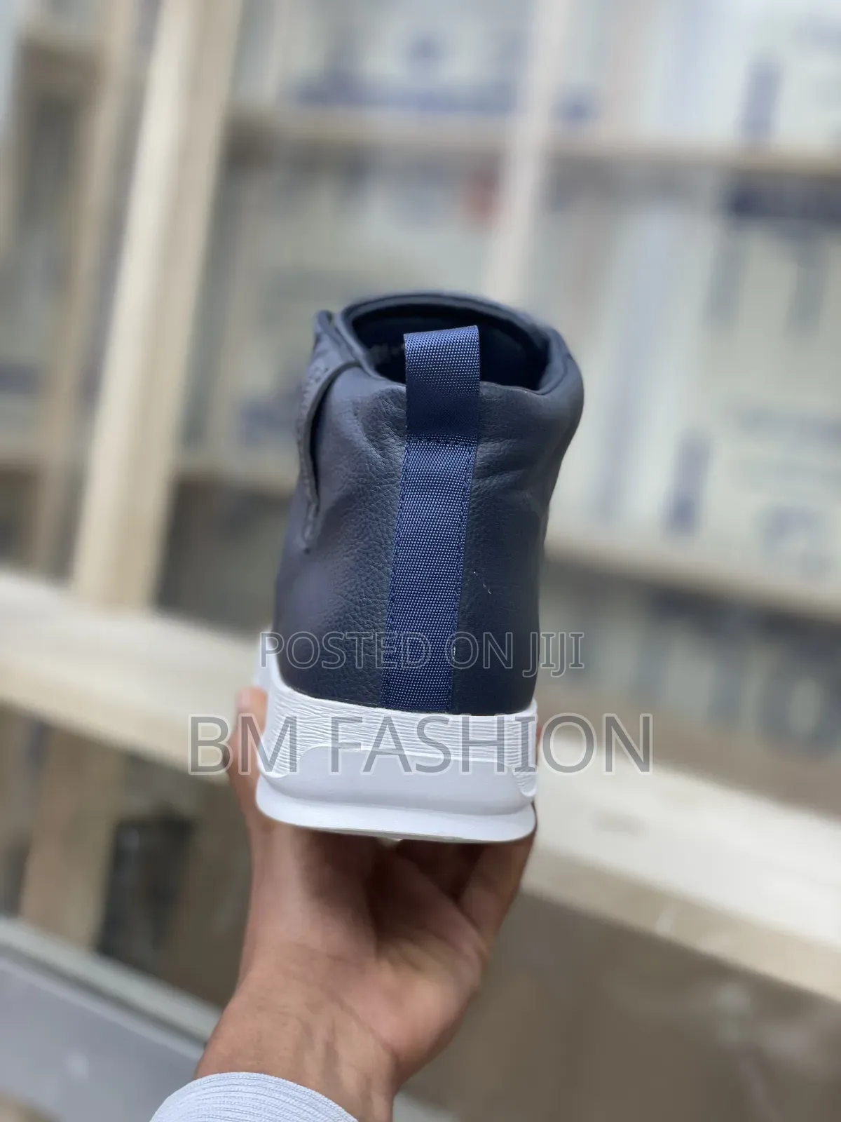 Timberland High-Top Sneakers With a Navy Blue Upper and a White Sole