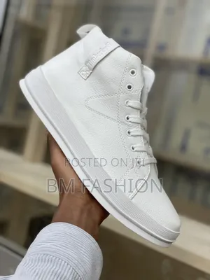 Photo - Authentic White Timberland High-Top Sneakers