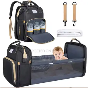 Photo - Baby Diaper Bag And Foldable Bed የህፃናት ዕቃ መያዣና ተጣጣፊ ማስተኛ ቦርሳ!
