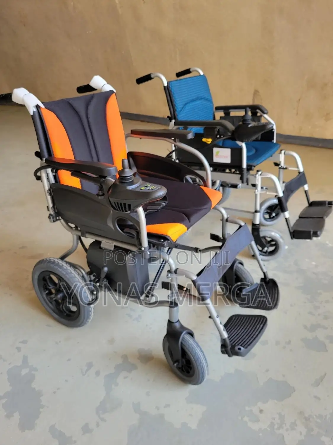 Electrical Wheelchair輝∆Rechargeable Battery With Range Specifications.