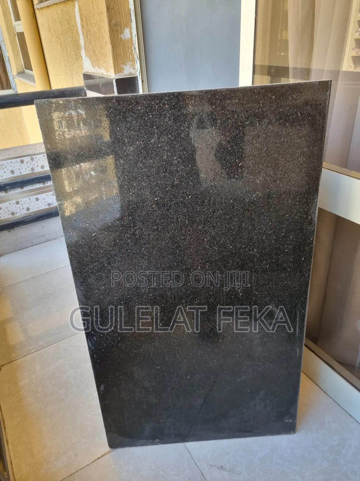 Granite Black እምነበረድ