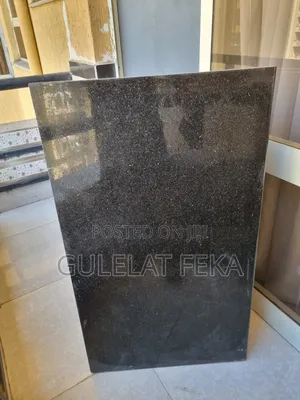 Photo - Granite Black እምነበረድ
