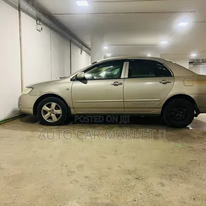 Photo - Toyota Corolla 2005 Yellow