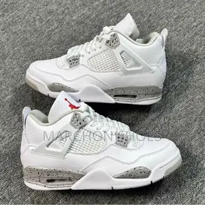 Photo - Air Jordan 4 Retro “White Oreo”