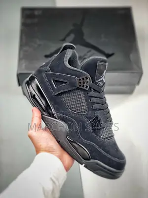 Photo - Air Jordan 4 Retro “Black Cat”