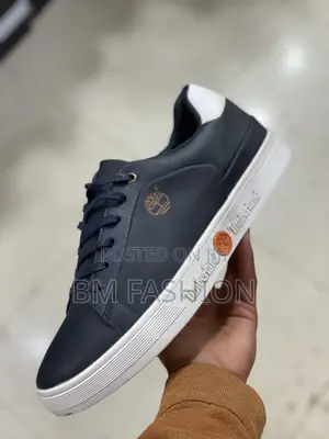 Photo - Timberland Low-Top Casual Leather Sneakers in Navy Blue