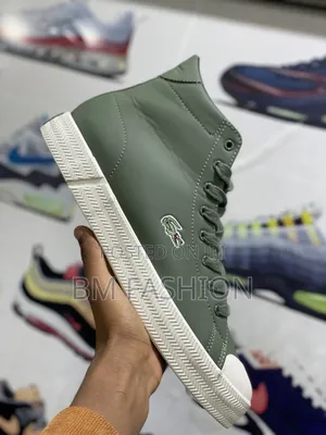 Photo - Lacoste Gripshot Mid Sneakers in a Green Color