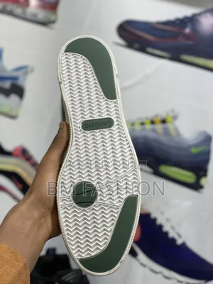 Lacoste Gripshot Mid Sneakers in a Green Color
