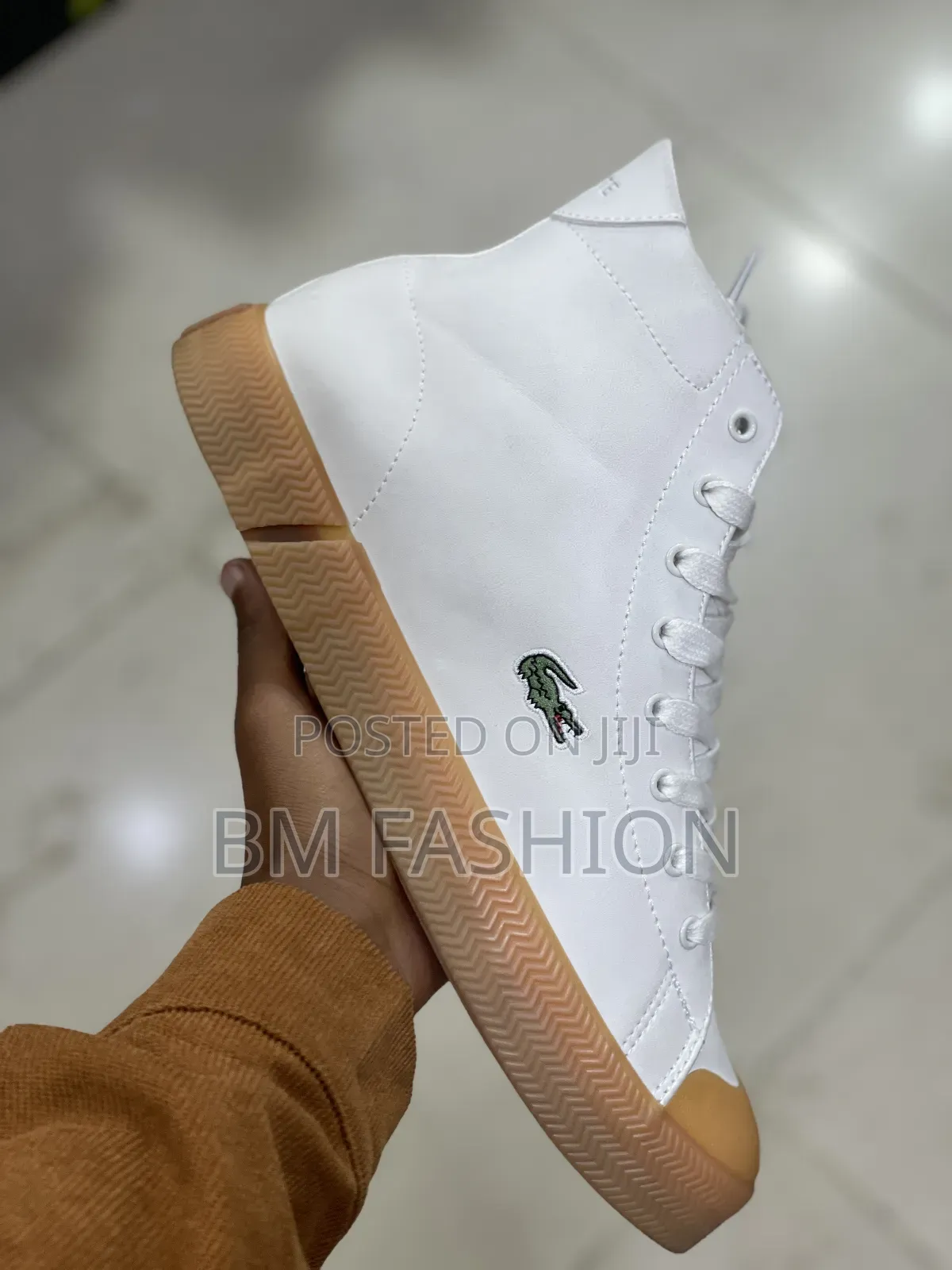 Lacoste Gripshot Mid Sneaker in White With a Gum Sole