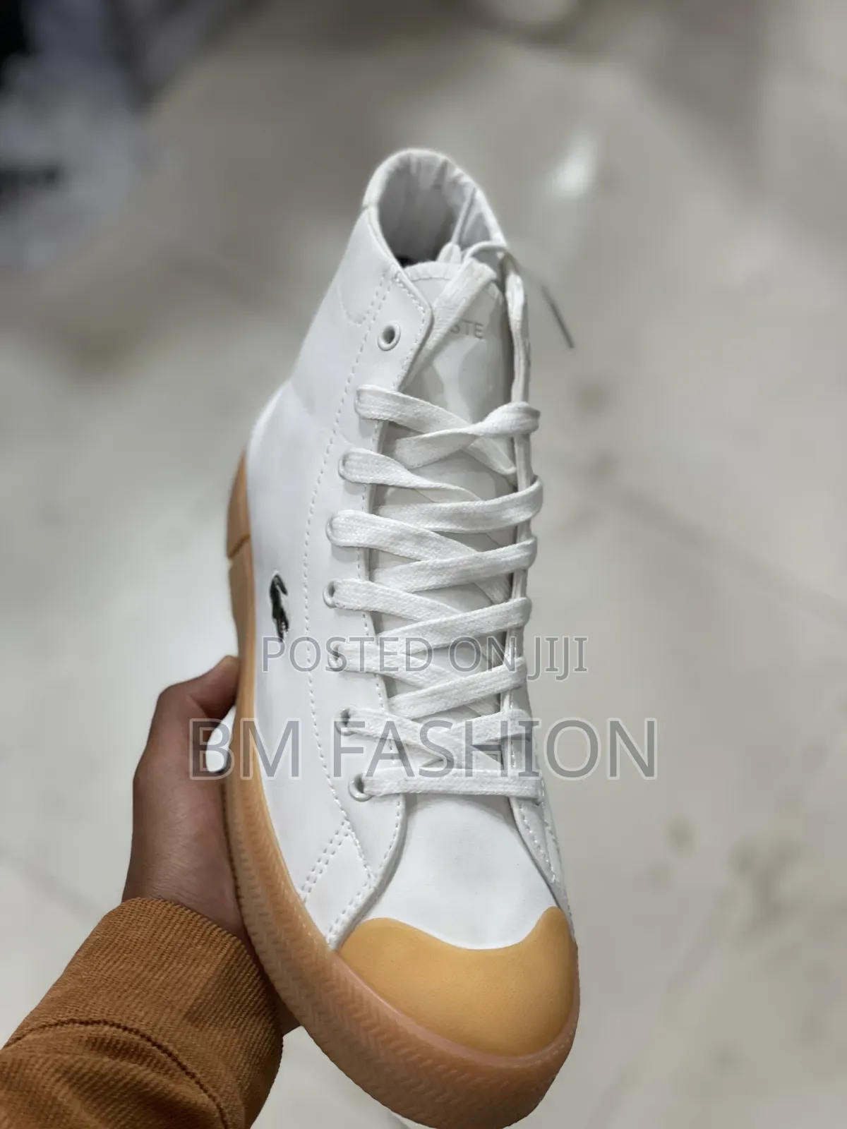 Lacoste Gripshot Mid Sneaker in White With a Gum Sole