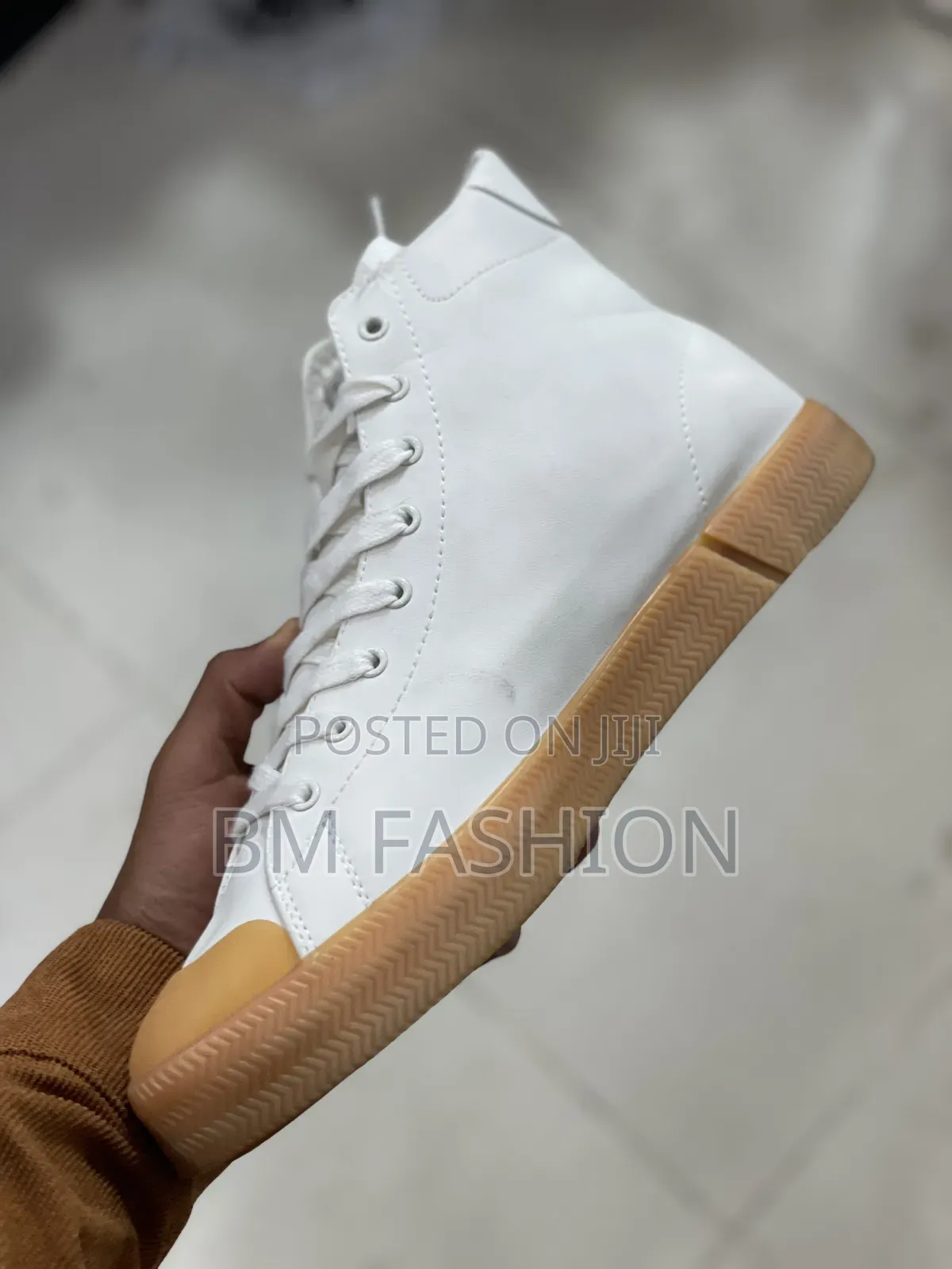 Lacoste Gripshot Mid Sneaker in White With a Gum Sole