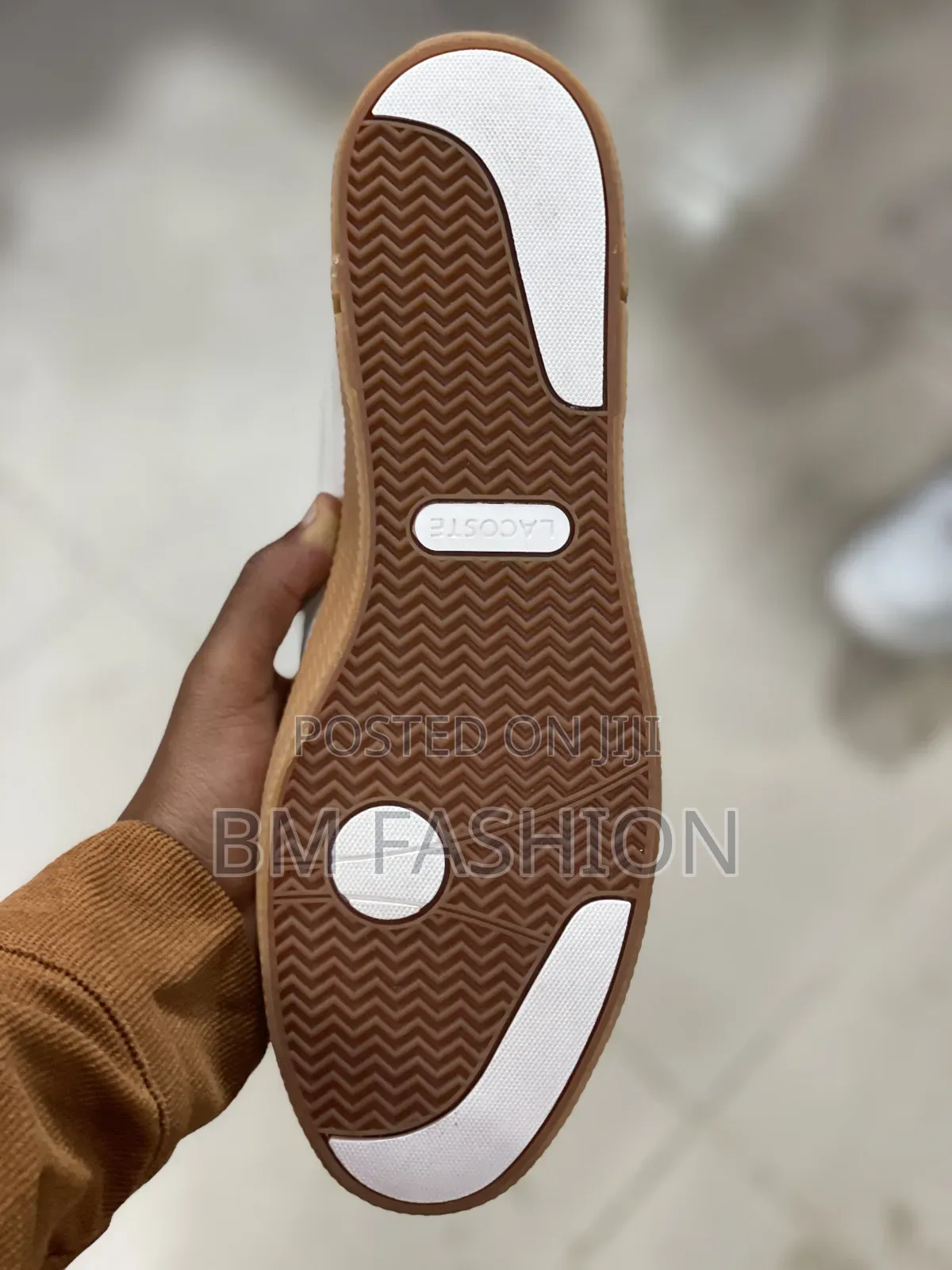 Lacoste Gripshot Mid Sneaker in White With a Gum Sole