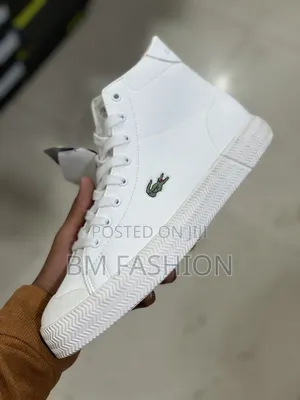 Photo - A White Lacoste Gripshot Mid Sneaker