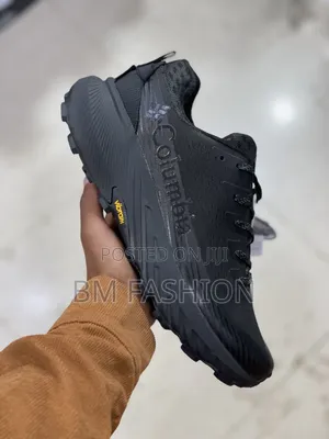 Photo - Black Merrell Agility Peak 5 Trail Running Shoes With a Vibram Outsole