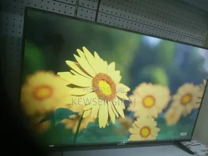 Photo - Super Fine 55inch Tv Double Glass Remote Smart Android Tv