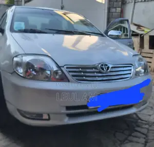 Photo - Toyota Corolla Sedan 2003 Silver
