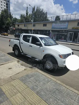 Photo - Mitsubishi L200 2006 White