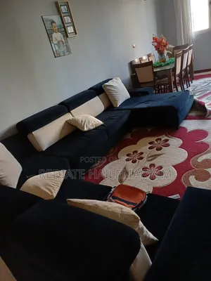 Slightly Used Confortable Sofa and Carpent and Central Tabel Food Tabl