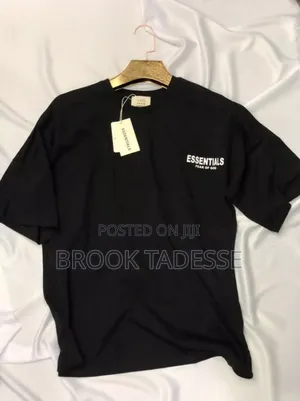 Photo -  Sleek Black Tee – Modern, Minimal Ready to Style