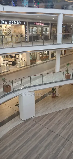 Photo - 95% ያለቀ የንግድ ሱቅ እና አፓርትመንቶች