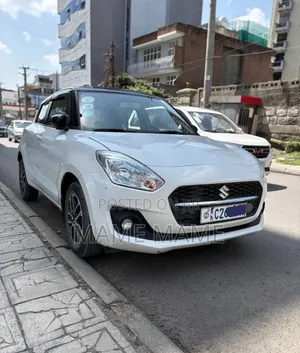 Photo - Suzuki Swift 2022 White