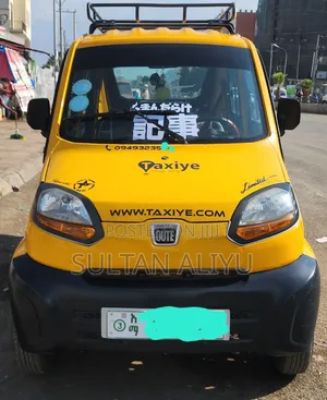 Photo - New Bajaj Qute 2022 Yellow