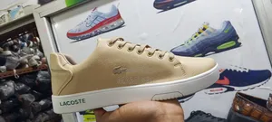 This Is Apair Lacoste Snicers in Beige /Tan Color