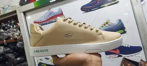 This Is Apair Lacoste Snicers in Beige /Tan Color