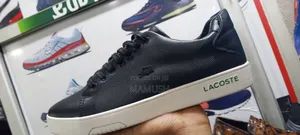 This Is Apair Lacoste Snicers in Beige /Tan Color