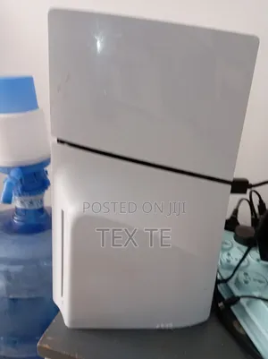 Photo - Ps5 Slim With 3 Game