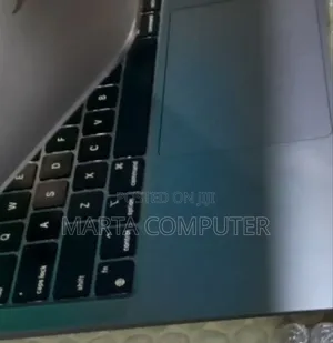 Photo - New Laptop Apple MacBook Air 2022 M2 8GB Apple M1 SSD 256GB