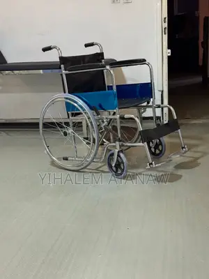 Chrome Steel Folding Manual Basic Wheelchair With Foldable Backrest