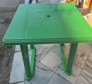 Photo - 80 by 80 Cm Green Plastic Table | እግሩ የሚነቃቀል ነው
