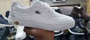 This Is Apair of Lacoste Snickers With a Multicolor Men's Shoes