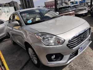 Photo - Suzuki Dzire 2021 Silver