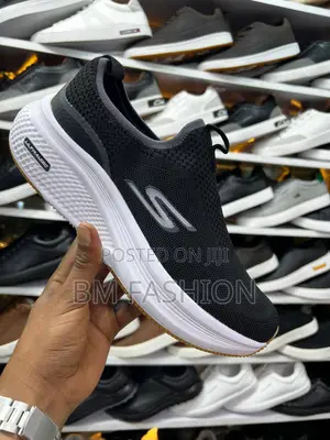 Photo - Black Skechers Ultra Light Slip-on Sneaker