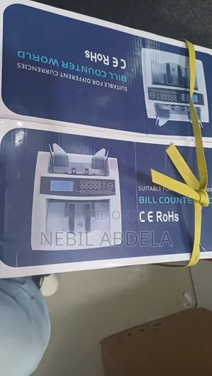 Photo - Cash Counter(ብር መቁጠሪያ)
