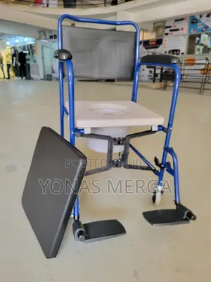 Photo - Toilet Chair鄔舍commode Chair覇旵can Be Wheeled Over a Standard Toilet.